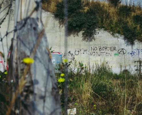 This is a deserted refugee camp in Calais, France. This remained.